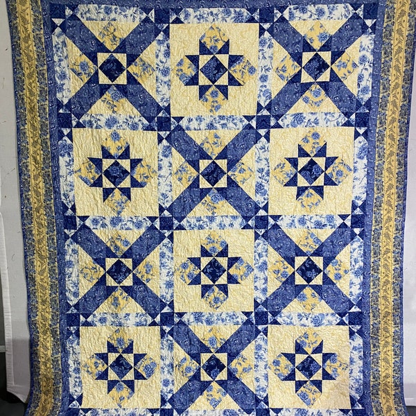 Handmade Quilt 67”x85”Spinning Stars, blue and yellow Moda fabric