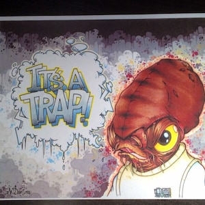 May include: A cartoon illustration of a brown alien with a yellow eye and a white shirt. The alien is saying "It's a trap!" in a speech bubble. The background is a dark gray with white and red splatters.