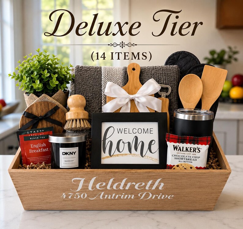 May include: A wooden gift basket labeled Heldreth 4750 Antrim Drive containing 14 items including a Welcome Home sign, a DKNY candle, Stash English Breakfast tea, Walker's shortbread, a small potted plant, wooden utensils, a cutting board, and a towel.