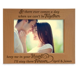 May include: A wooden picture frame with a laser-engraved message that reads "If there ever comes a day when we can't be Together keep me in your Heart I'll stay there Forever" with the names "April & James" at the bottom. The frame has a photo of a couple looking at each other.