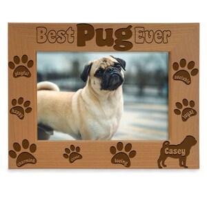 May include: A wooden picture frame with the words "Best Pug Ever" and paw prints with words like "playful" and "happy." The frame holds a photo of a pug dog. The dog's name, "Casey," is also on the frame.