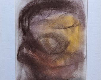 May include: Abstract portrait drawing in shades of brown, yellow, and purple. The drawing is framed and has the word "jawbreaker" written below it.