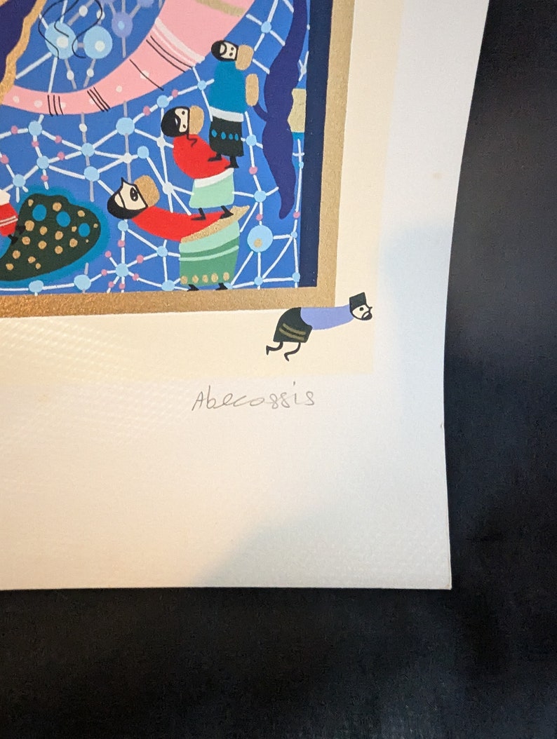 May include: A colorful print of a scene with multiple figures in a blue and gold frame. The print is signed "Abecossis" in the bottom right corner.
