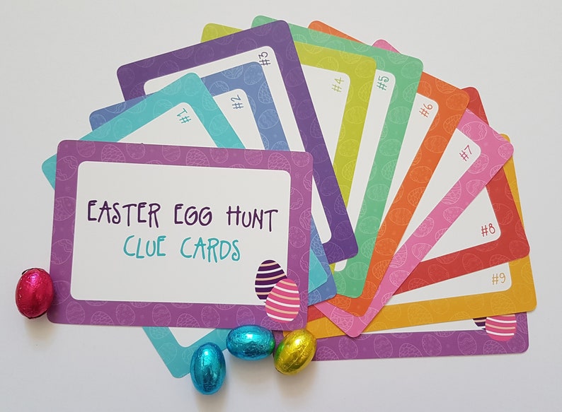 May include: A set of nine colorful Easter egg hunt clue cards with a purple card in the front that says "Easter Egg Hunt Clue Cards".