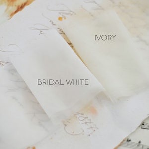 Image of tulle color swatches in Bridal White and Ivory.