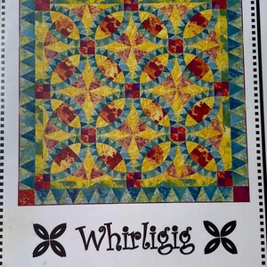 May include: A colorful quilt pattern titled "Hana Highway" by Whirligig Designs. The design features a repeating pattern of yellow, red, and blue shapes. The quilt has a border of blue triangles and a white background.