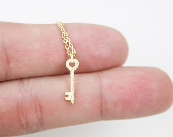 Gold /Silver Tiny Key Charm Necklace . Dainty and Simple Everyday Necklace . Birthday Gift