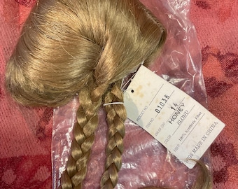 Doll wigs w/ braids and bangs by Dollsparts 1990's new vintage. several sizes and colors