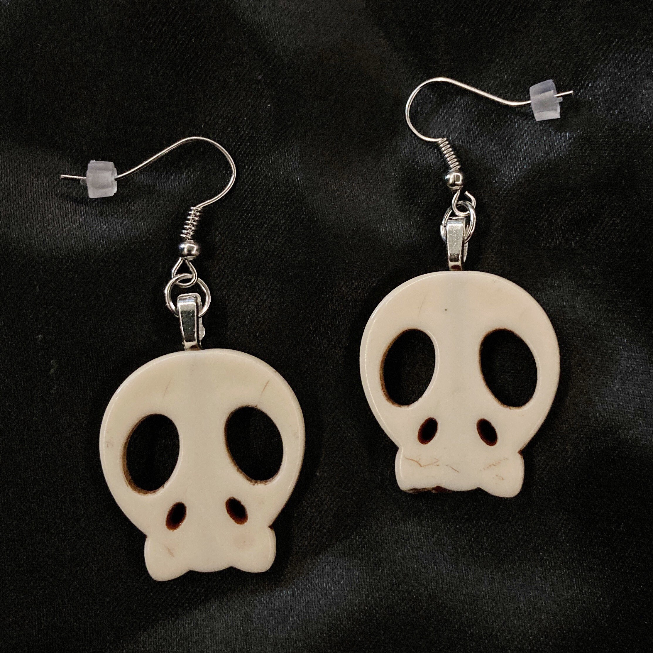 Skull earrings shop dangle