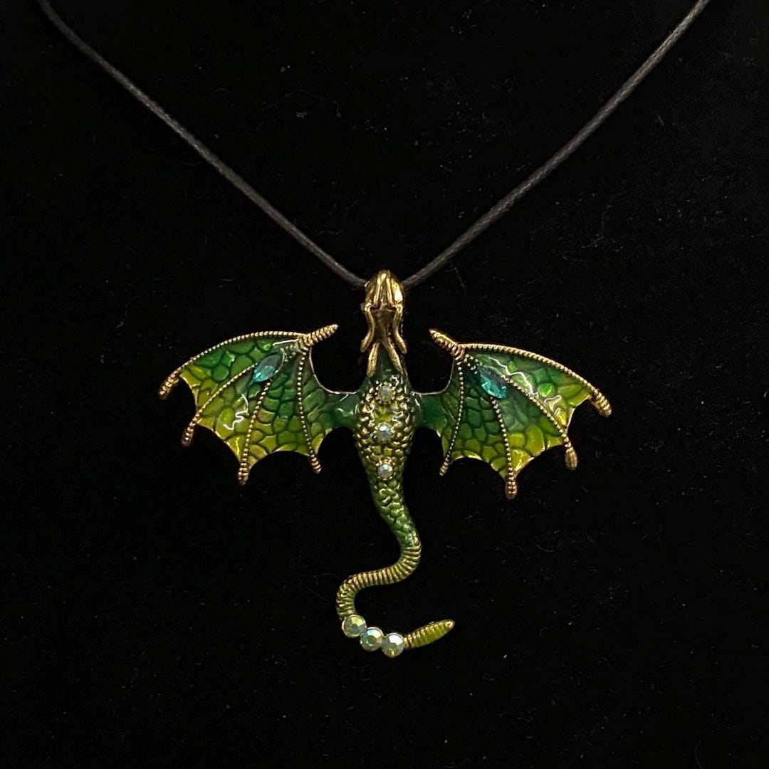 Pendentif poisson en or certifié en jade rouge et diamants. Prosperité