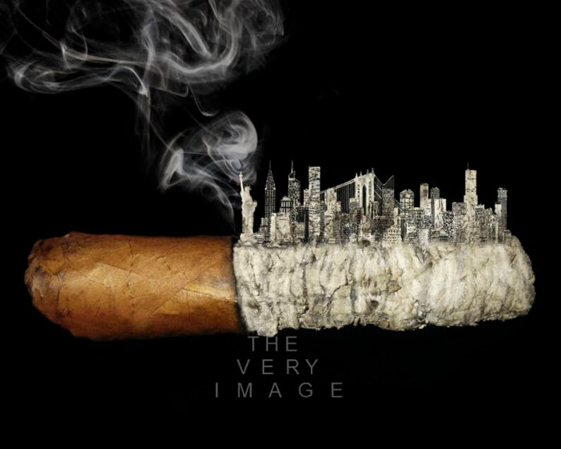 May include: A black and white illustration of the New York City skyline on top of a lit cigar with smoke rising from the top. The text "THE VERY IMAGE" is below the cigar.