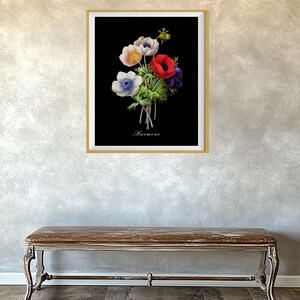 May include: A black and white botanical illustration of a bouquet of white, red, and blue anemones with the word "Anemone" printed below the flowers.