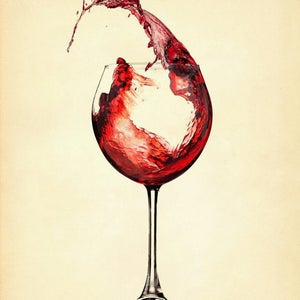 May include: A glass of red wine with a splash of wine coming out of the glass.