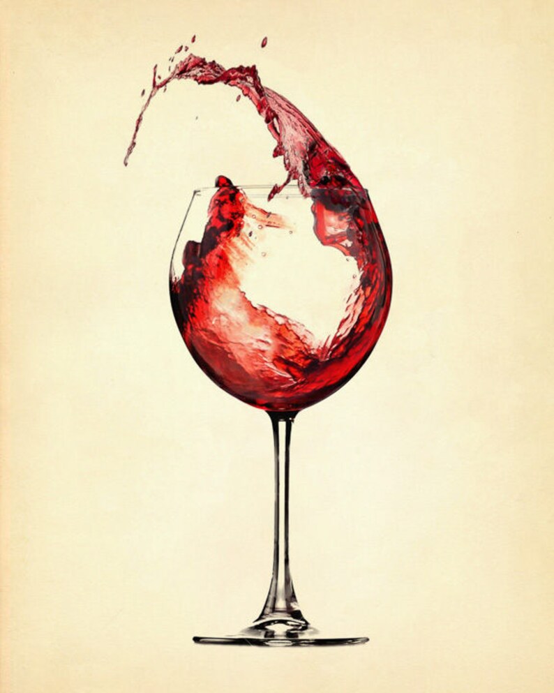 May include: A glass of red wine with a splash of wine coming out of the glass.