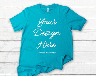 Blue Aqua Shirt Flat Lay Mockup Bella Canvas 3001 Light Wood Background Flatlay TShirt Product Photography Shirt Designs