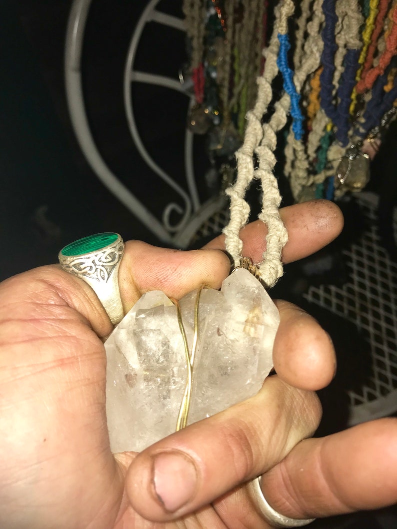 Double Crystal Tips wrapped in gold wire and attached to an 24\u201d all Natural Hemp woven necklace