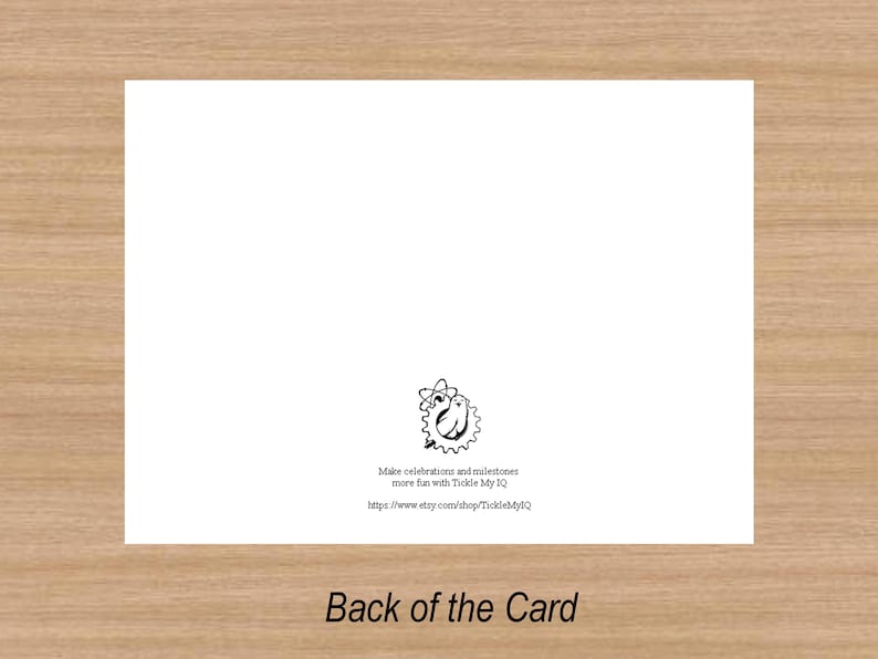 May include: The back of a white card with black text that reads "Make celebrations and milestones more fun with Tickle My IQ" and a website address. The card has a small black and white illustration of a cartoon character.