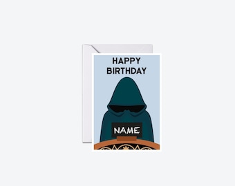 May include: A birthday card featuring a teal hooded figure with the words "HAPPY BIRTHDAY" in black. The figure holds a sign that says "NAME" in white. The card is in a white envelope.