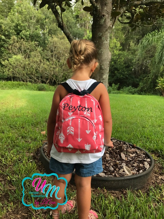 Green arrow backpack 2025