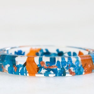 Nature Inspired Resin Ring With Pressed Blue Queen Anne Lace Flowers and Orange Petals - Thin Ring - Clear Ring Band