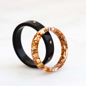 Set aus schwarzen und goldenen Harzringen, Harzringe für Paare, wunderbare Harzringe für Geschenke, Weihnachtsgeschenk