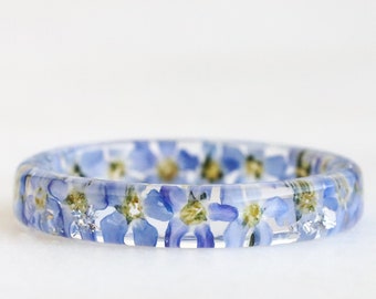 Nature Inspired Clear Resin Ring Band with Pressed Light Blue Forget-Me-Not Flowers and Gold Flakes - Real Flowers Inside