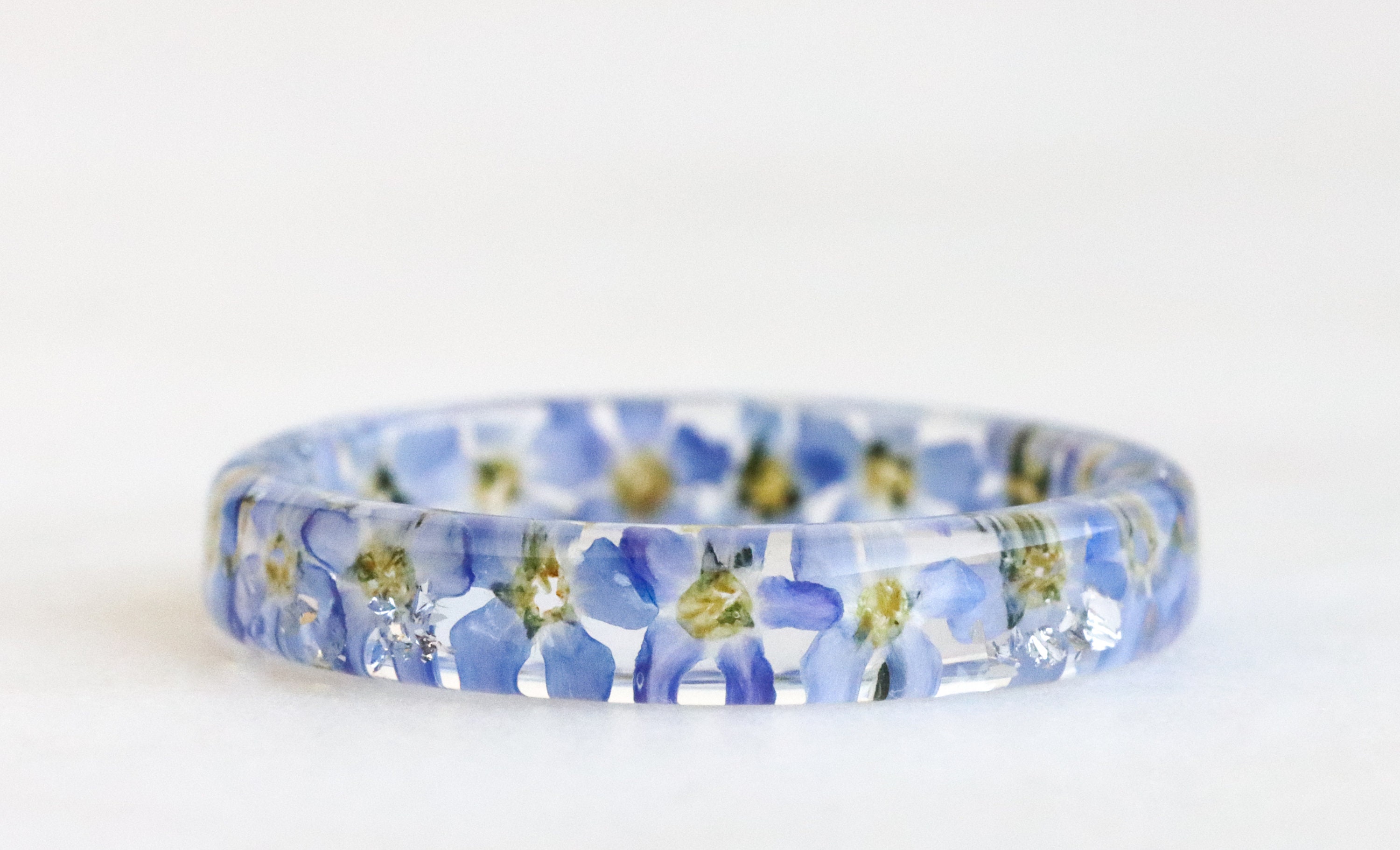 Nature Inspired Clear Resin Ring Band with Pressed Light Blue Forget-Me-Not Flowers and Gold Flakes - Real Flowers Inside