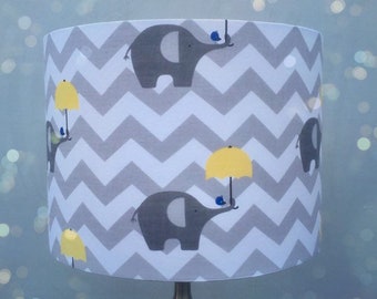 Elephants and umbrellas lampshade in sizes 15cm right up to 45cm diameter .