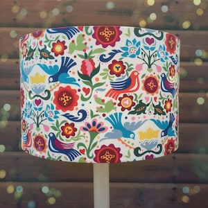 Bright and cheerful fabric lampshade in Mexican 'La Paloma Tea' material.