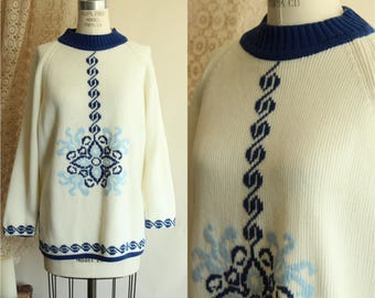 Suéter vintage dos anos 70, modelo nórdico azul e branco da The Campus Shop.