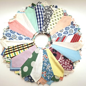 Vintage Dresden plate hand pieced and hand sewn quilt top pieces - 13 inch in diameter Dresden plate pieces, thirties to sixties fabrics