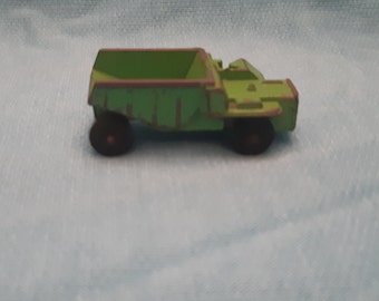 Vintage Die cast green dump truck. Tootsie Toy Car, metal toy, some wear, green truck,  retro truck,  MCM toy car, Made in the USA,