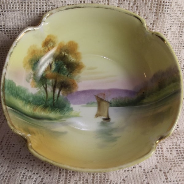 Nippon green stamped noodle bowl in fine porcelain handpainted landscape scene including a Japanese boat on water trees purple mountains