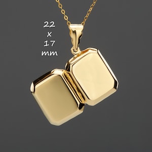 May include: Gold locket necklace with a rectangular shape. The locket is 22 x 17 mm.