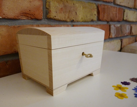 small unfinished wooden chest
