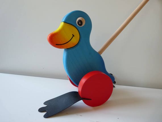 wooden duck toy on a stick