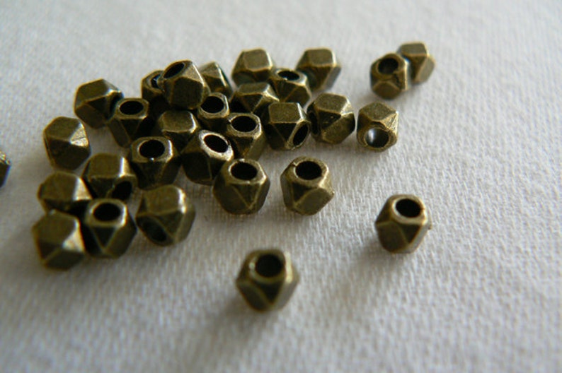Antique brass square spacersfaceted spacersfits 1mm cord Etsy
