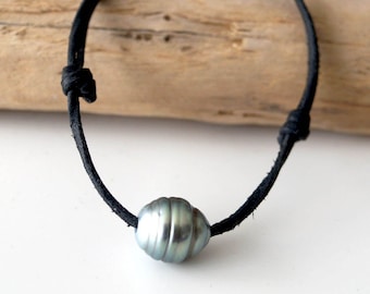 Tahitian pearl,  adjustable australian leather, woman bracelet