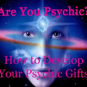 May include: A blue and purple background with a woman's face in the center. The woman has blue eyes and a white light above her forehead. The text "Are You Psychic? How to Develop Your Psychic Gifts" is in pink letters.