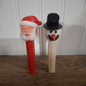 Two Vintage Christmas Pez Dispensers Santa Snowman No Feet Made Yugoslavia