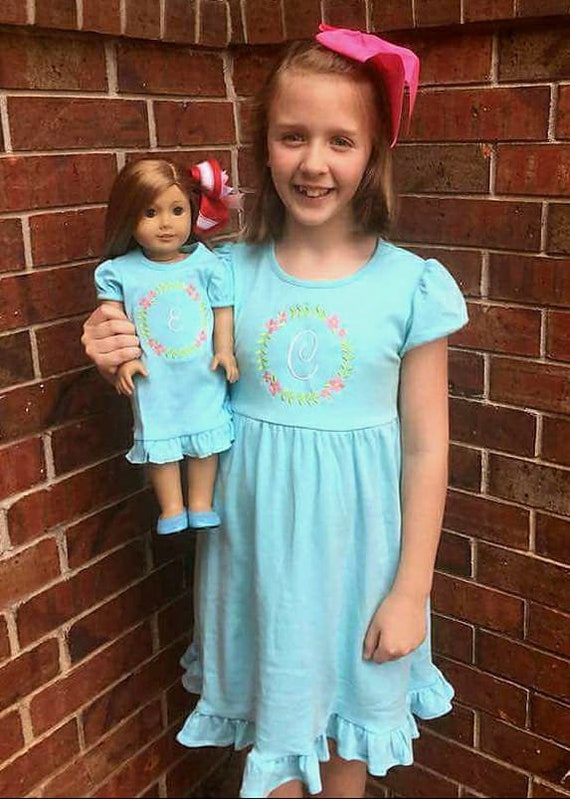 girl and doll matching dresses