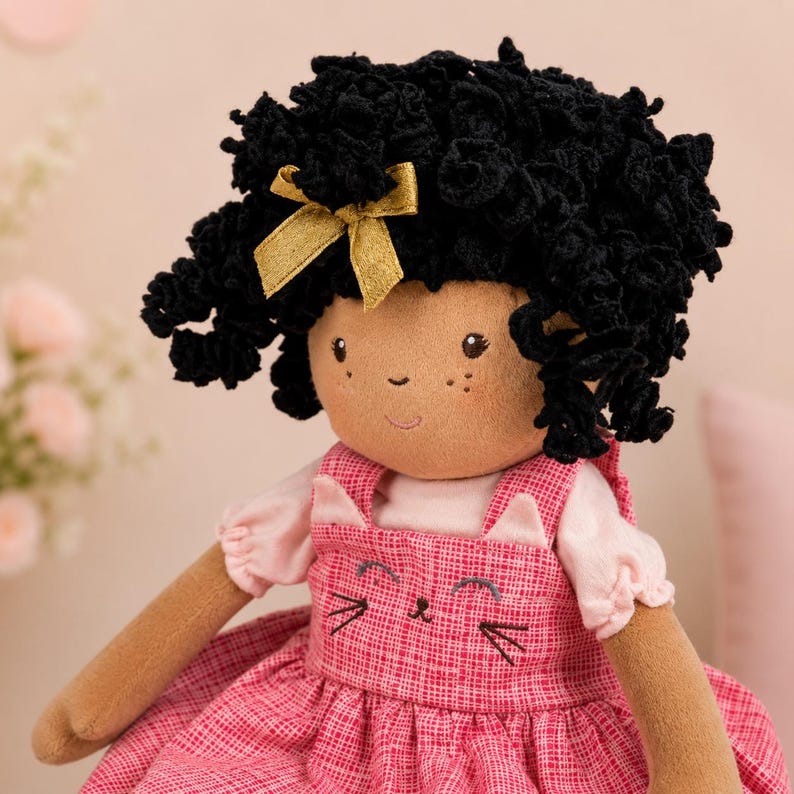 Custom Name Birthday Gift Personalized Cloth Doll African American Representation Handmade Fabric Ragdoll 16 Inch Size Embroidered Details Curly Hair Styling Gold Bow Accent Jumper Dress Cat Face Design Matching Shoes Soft Safe Toddler Gift