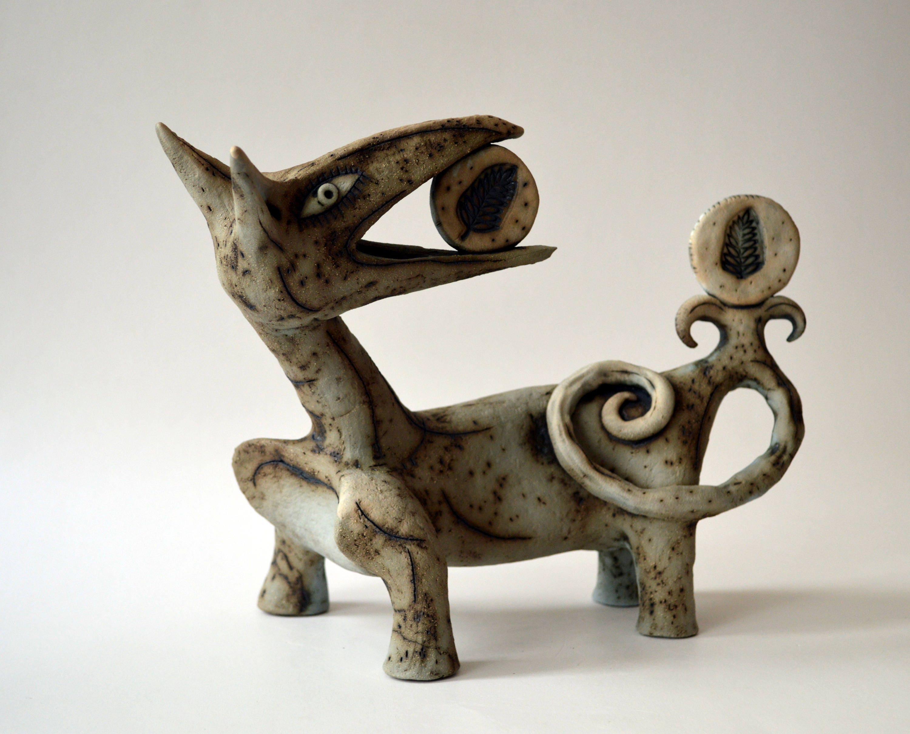 ceramic wolf statue