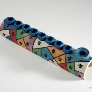 Ceramic colorful handmade menorah Hanukkah