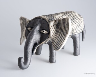 cute little funny black ceramic elephant figurine