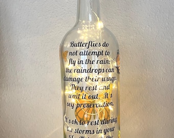 Lámpara de botella de vino con forma de mariposa