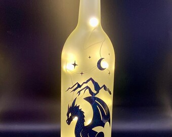 Lámpara de botella con forma de dragón de libro