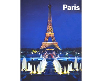 May include: A nighttime view of the Eiffel Tower in Paris, France. The tower is illuminated with golden lights, and there are fountains in the foreground.