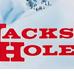 Może przedstawiać: Czerwony tekst na białym tle z napisem "JACKSON HOLE".