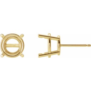 May include: A pair of gold-colored earring settings. One setting is a circular design with four prongs, and the other is a post-style setting. The earrings are designed to hold a round gemstone.